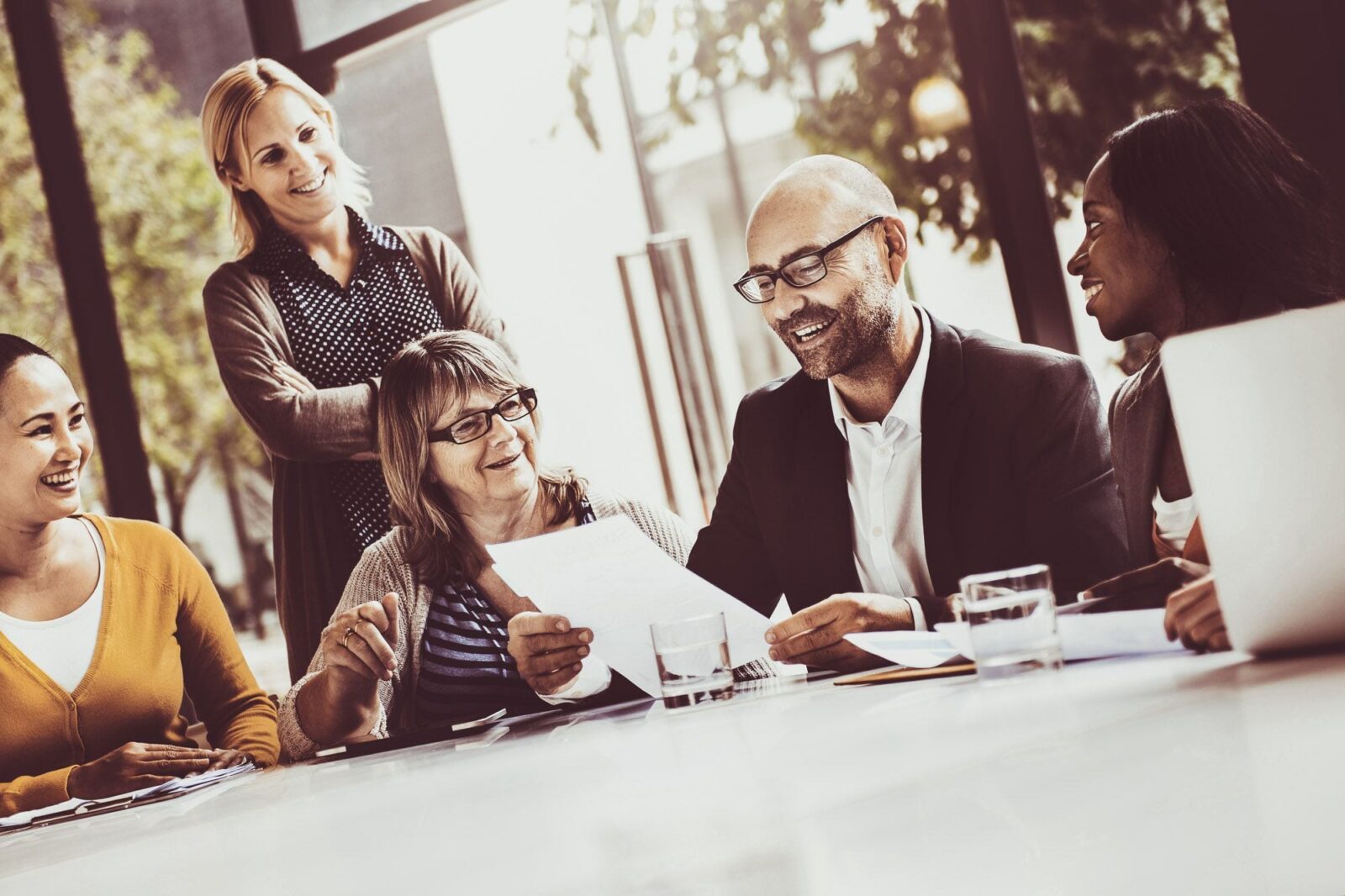 Group of diverse workers discussing legislation about equality and diversity